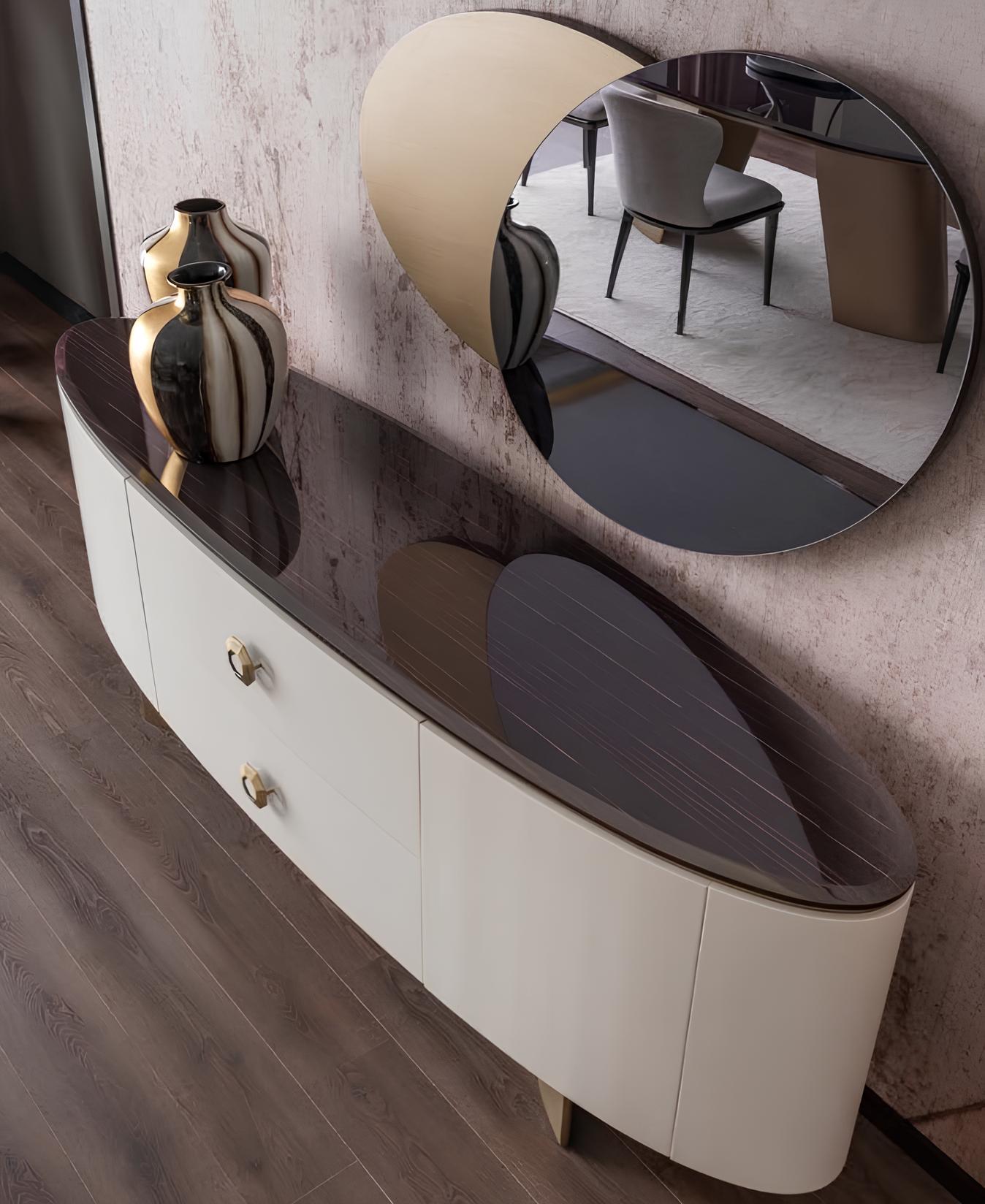 Elegant dining room set with sideboard and matching mirror.