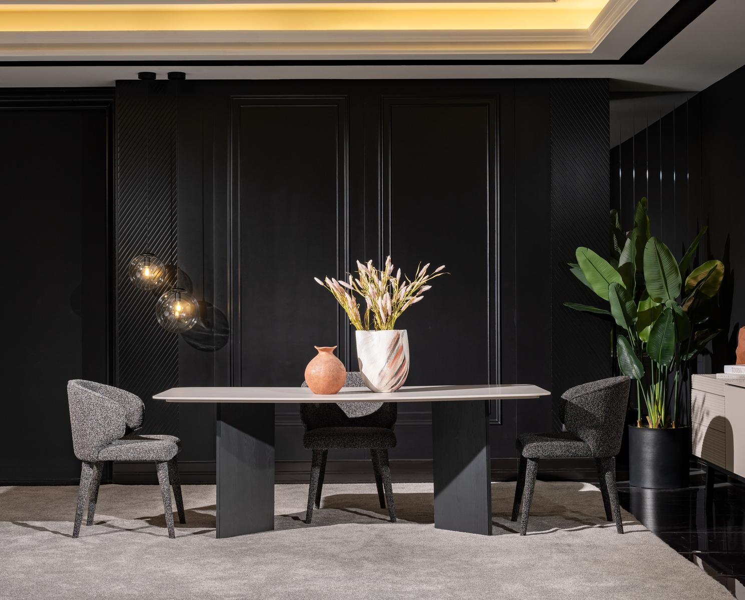 Elegant wooden dining table in beige for modern and classic settings.