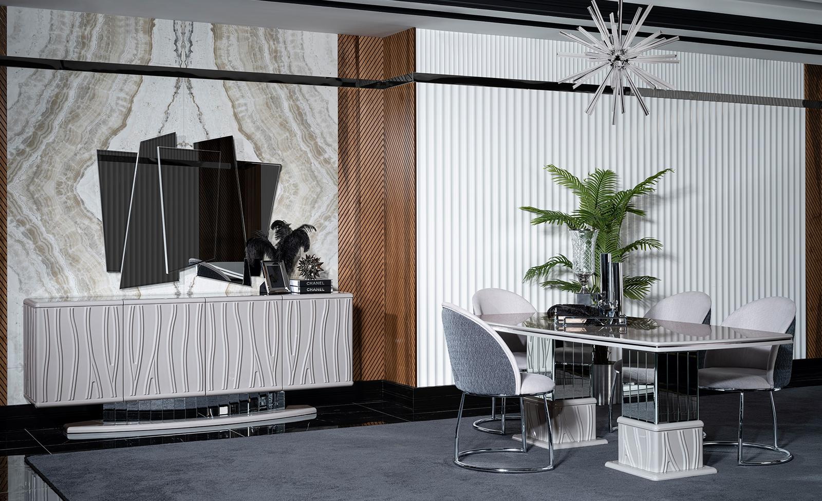 Elegant white dining room set made of wood with mirror and sideboard.