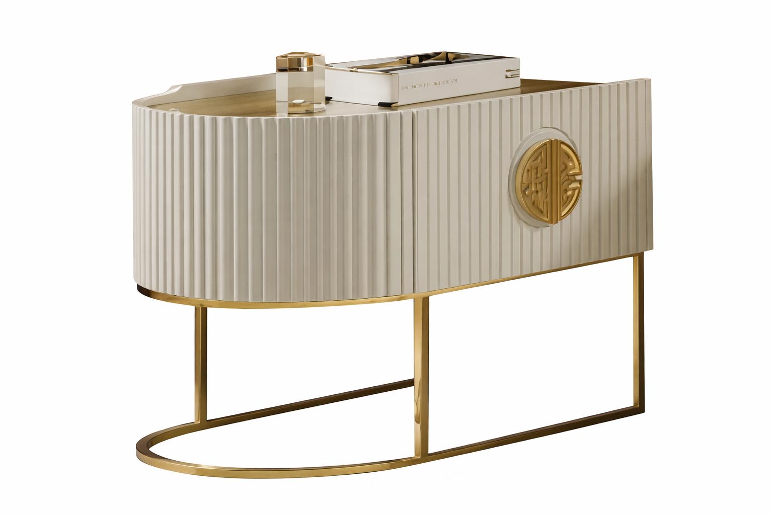 Elegant bedside table with gold accents and ornate detail