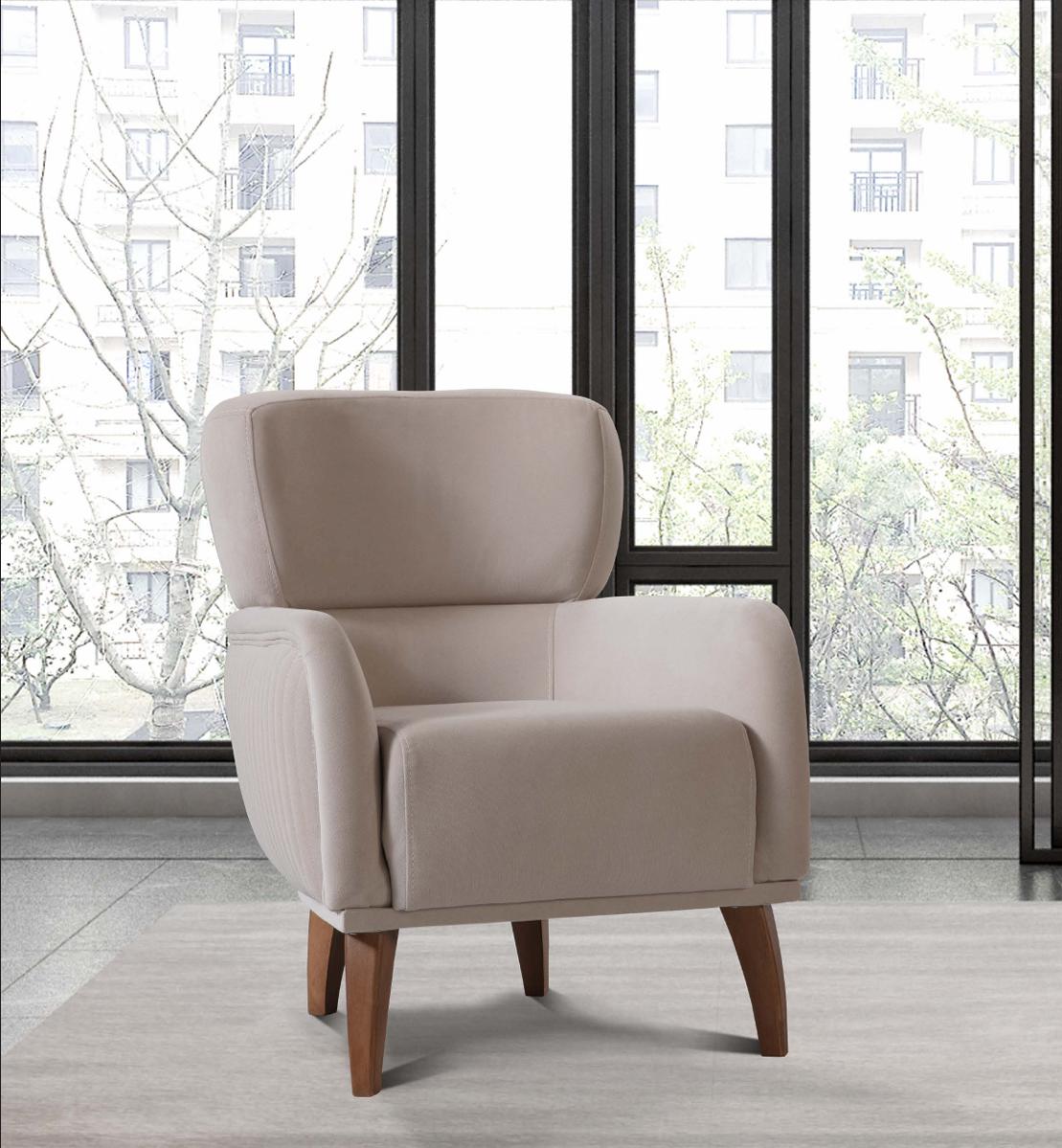 Designer beige armchair with a sturdy wooden frame for cozy corners
