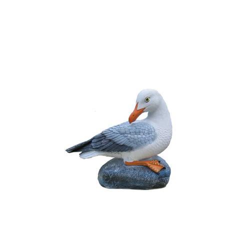 Decorative sculpture designed as a natural colored seagull sitting on a stone 27cm
