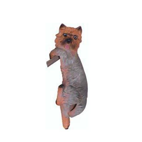 Decorative sculpture designed as a natural colored motley shaggy hanging puppy 24cm