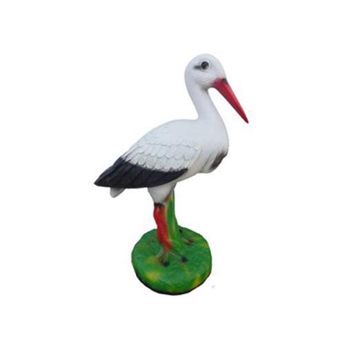 Decorative sculpture designed as a natural colored standing on the grass stork 38 cm