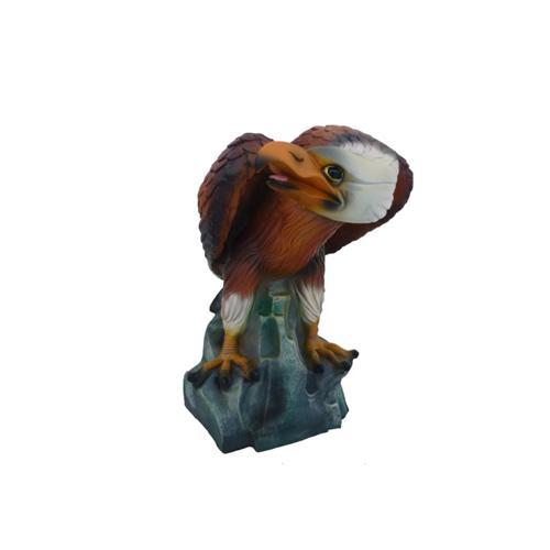 Natural colored decorative figure of an eagle on a stone 40cm