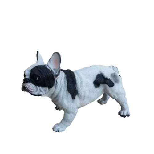 Decorative sculpture designed as a motley white black colored stanning dog 30x45cm