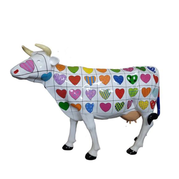 Decorative sculpture designed as white bull with hearts pictures 147x210m sizes