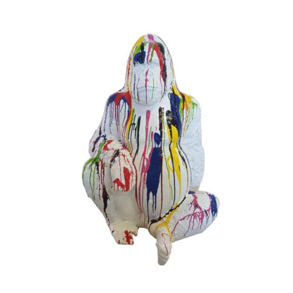 Abstract decorative sculpture designed as white colored sitting gorilla in colorful stripes 110cm