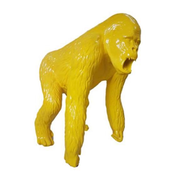 Abstract decorative sculpture designed as a gloss full yellow colored gorilla 130cm