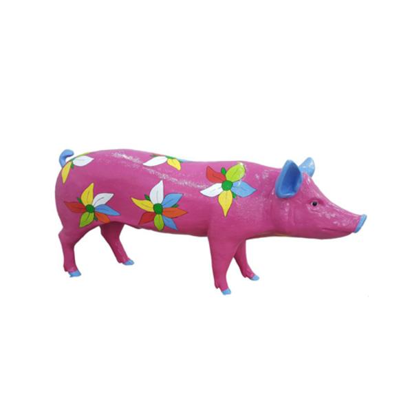 Decorative sculpture designed as pink colored pig figure with flowers 70x160cm sizes