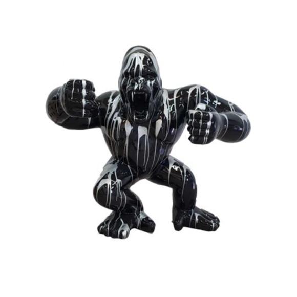 Decorative sculpture designed as a gloss full black colored shouting gorilla in white patterns 70x80x40cm