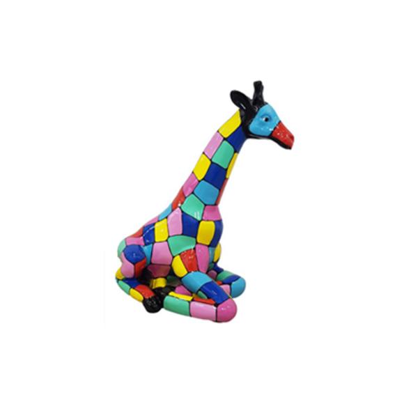 Decorative sculpture designed as a gloss sitting giraffe in colorful rectangular patterns 80cm