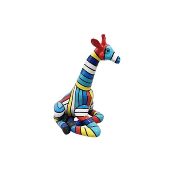 Decorative sculpture designed as a gloss sitting giraffe in light multi-colored stripes 80cm