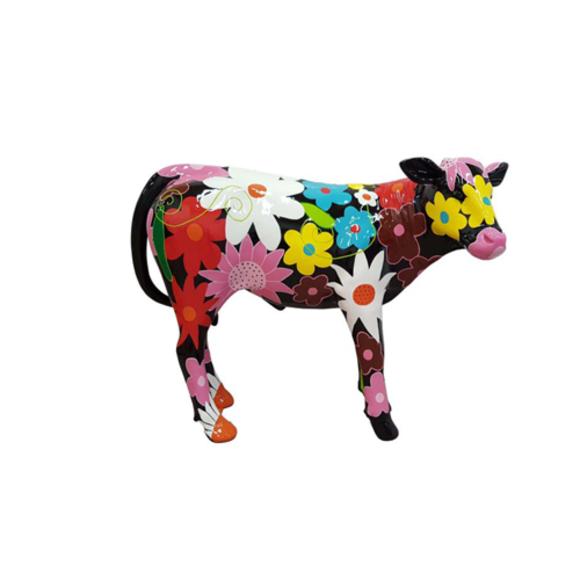 Decorative abstract sculpture designed as a standing black colored cow with colorful flower patterns 100x120cm