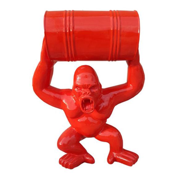 Full red colored decorative gloss sculpture designed as a shouting gorilla holding a barrel 100cm