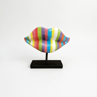 Abstract decorative sculpture designed as a lips in colorful stripes on a black stand 47cm