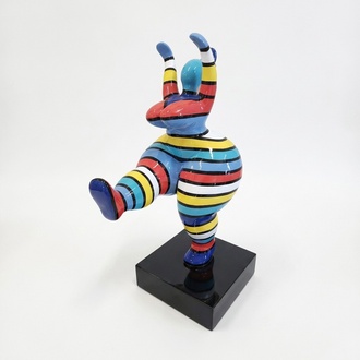 Abstract decorative sculpture designed as a gloss gymnastic figure on a black stand in colorful patterns 50cm