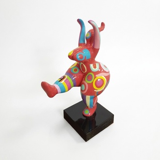 Pink gloss colored abstract decorative sculpture of a gymnastic figure in colorful patterns 50cm