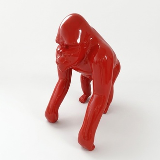 Abstract decorative sculpture designed as a gloss full red colored standing gorilla 70cm