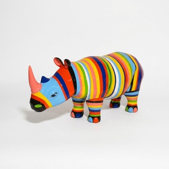 Abstract decorative sculpture designed as rhino figure with colored stripes 175cm length