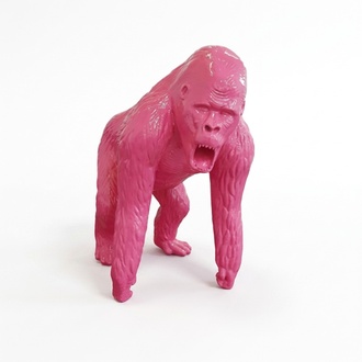 Abstract decorative sculpture designed as a gloss full pink colored gorilla 130cm