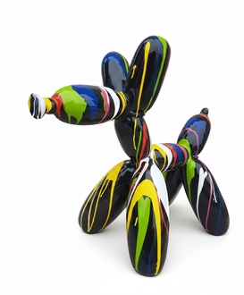 Abstract decorative sculpture designed as black colored balloon animal with colorful stripes