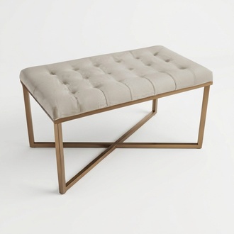 Beige wooden stool in an elegant design.