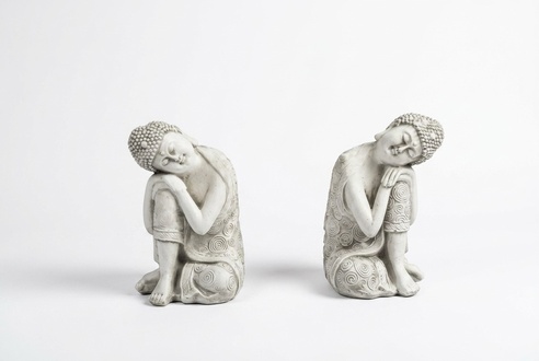 Buddha sculpture in stone look. Large sculpture for garden and living area