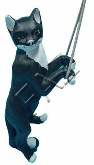 Decorative sculpture designed as motley black white colored cat on a rope 62cm height C100