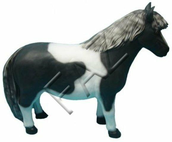 Decorative sculpture designed as motley black & white colored pony 126cm length