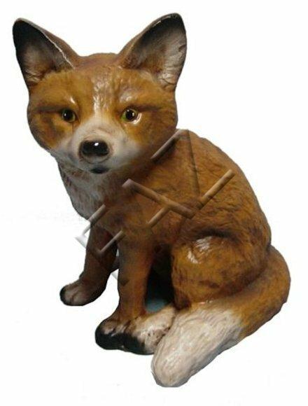 Decorative sculpture designed as light brown colored sitting fox cub with green eyes 29cm height