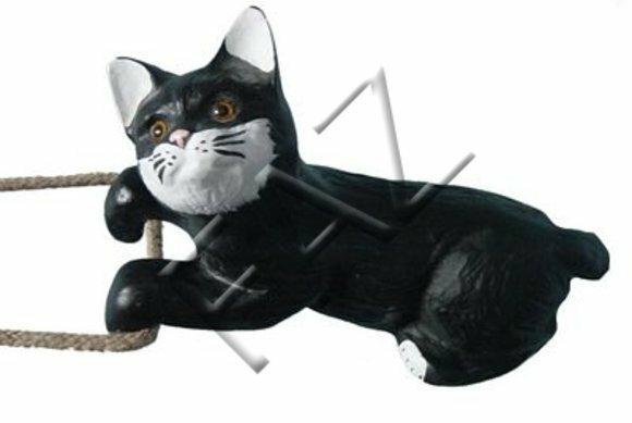 Decorative sculpture designed as lying motley black white colored kitty 15x29cm C346
