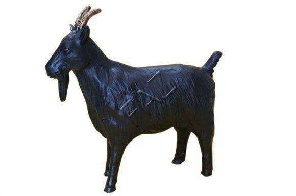 Decorative sculpture designed as gloss full black colored shaggy old goat