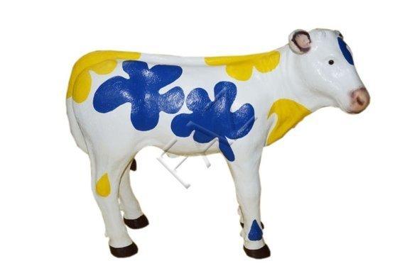 White colored cow figure garden decorative sculpture with blue & yellow flowers patterns