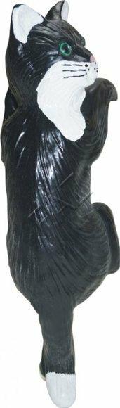Decorative sculpture designed as motley black white colored climbing cat with green eyes 41cm height C763