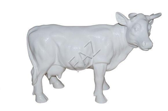 Full white colored decorative garden sculpture designed as gloss cow figure
