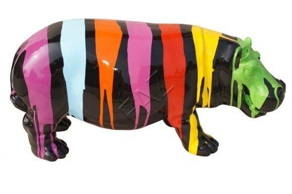 Decorative garden sculpture designed as gloss black hippo figure with colorful stripes