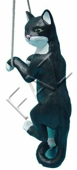 Climbing cat on a rope motley black white colored sculpture with green eyes 62cm height