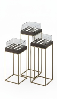 Candle holder set made of metal in modern elegant gray.
