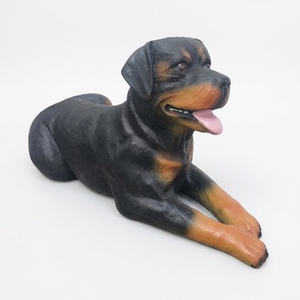 Decorative sculpture designed as an lying motley rottweiler dog 50x80cm A195