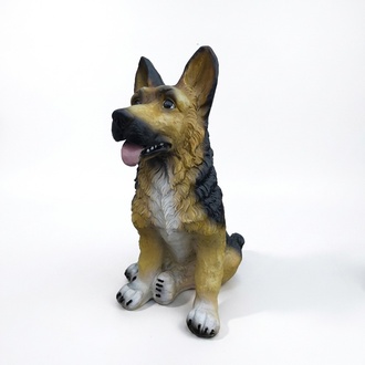 Decorative garden sculpture designed as an original motley colored german shepherd puppy 50 cm (A143)