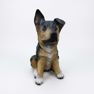 Motley dark brown colored decorative sculpture designed as a sitting puppy 38 cm (A336)