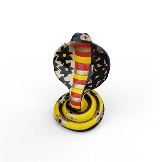 Decorative sculpture designed as a geometric cobra colored in red yellow stripes 90cm