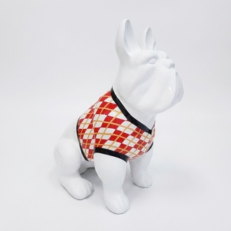 Decorative sculpture designed as an white sitting dog in rhombus red white shirt paint 85x116cm