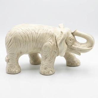 Decorative garden sculpture designed as a milky colored elephant 39x75cm
