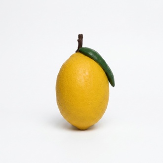 Decorative sculpture designed as an original colored yellow limon 66cm