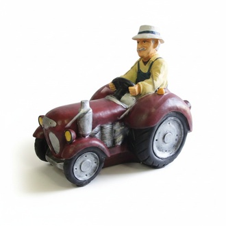 Decorative sculpture designed as a gardener on a traktor 56x64cm