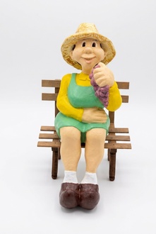 Decorative sculpture designed as woman sitting on a wooden bench 67cm b334