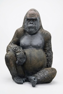 Motley black colored decorative garden massive sculpture of sitting gorilla 120x90cm