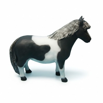 Decorative sculpture designed as motley black & white colored pony 126cm length